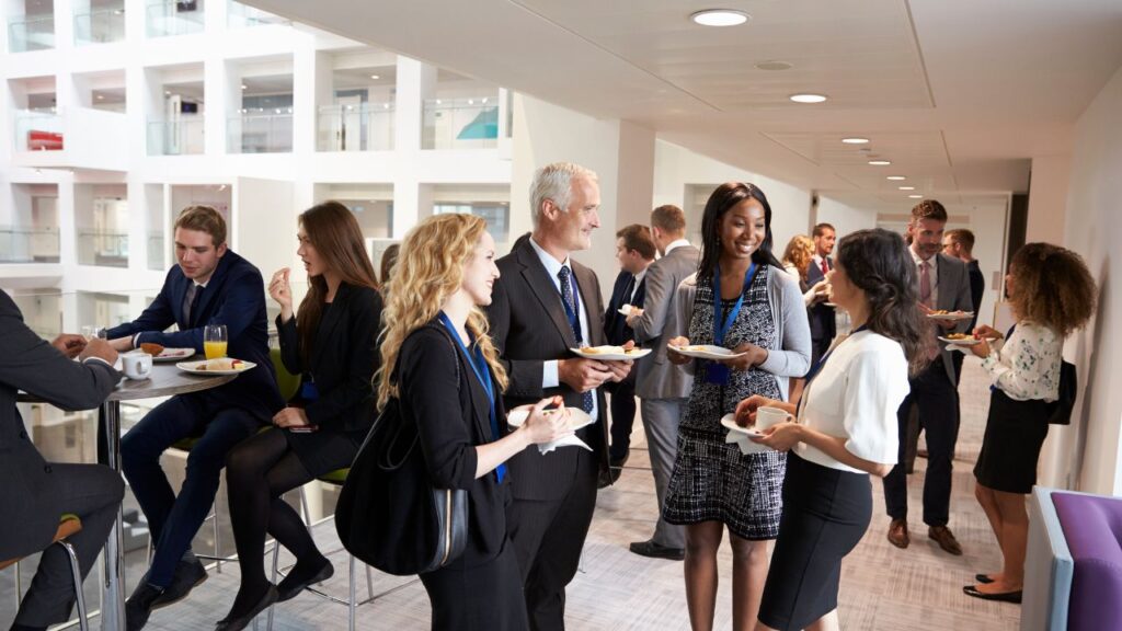 Professionals attending a coworking networking event.