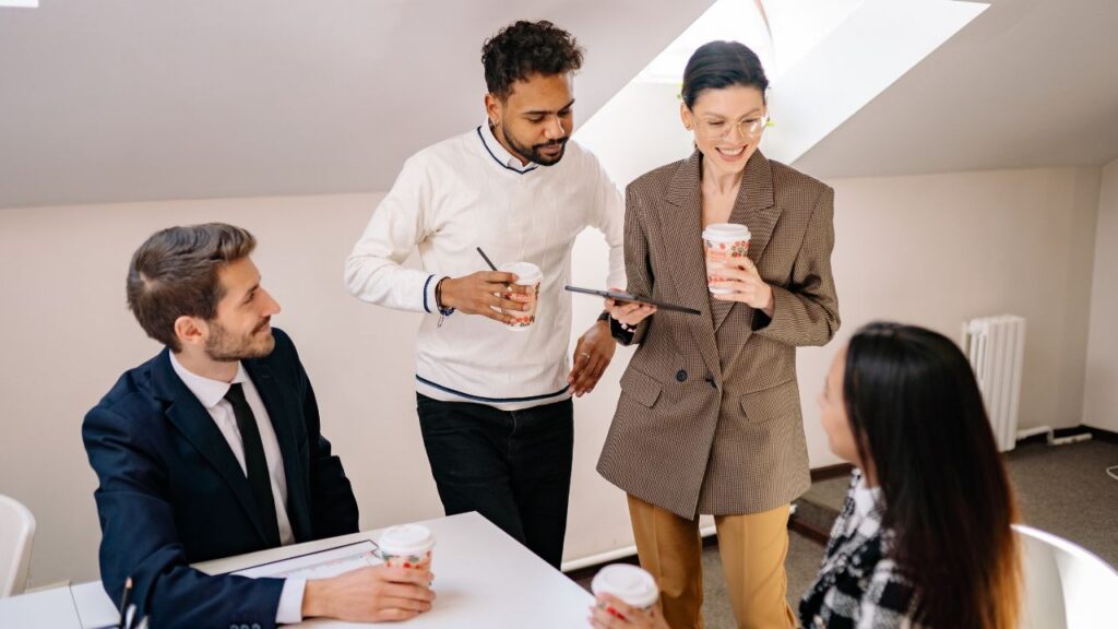 Coworking members collaborating in a shared workspace.