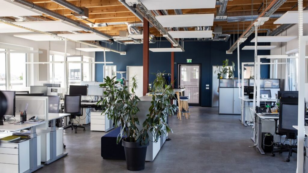 Professionals working in a shared coworking environment.